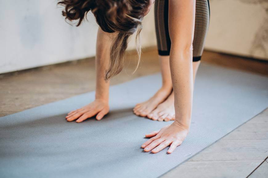 Doing yoga on Jade yoga mat