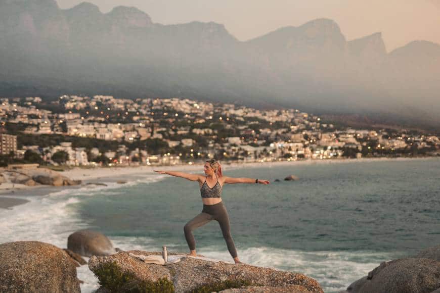 Doing yoga on a big rock