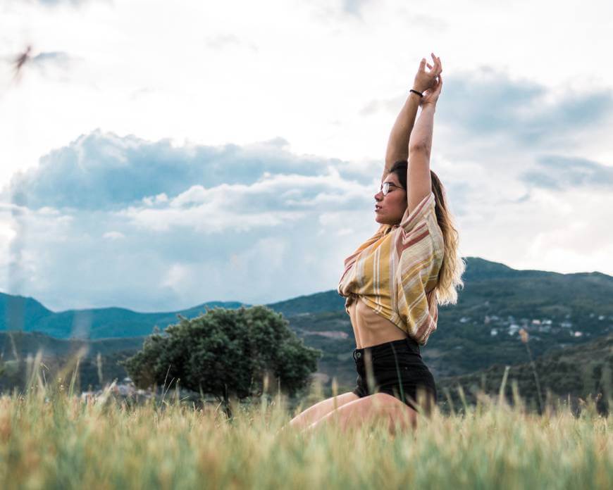 Doing yoga on grass